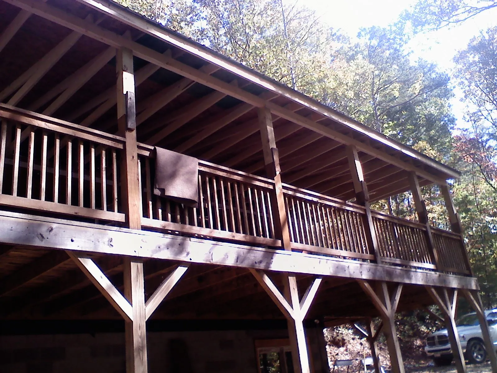 Timber framing under a new elevated porch and deck — Roof Leak Repair in Amazonia by Roofing Brothers